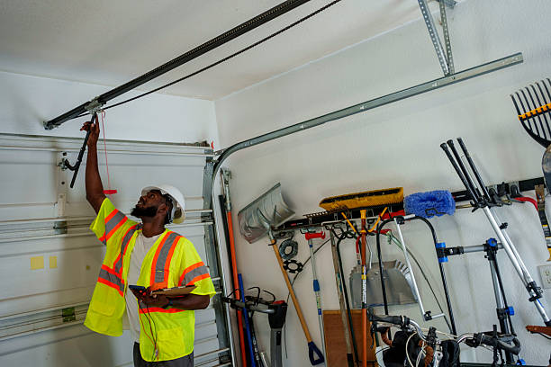 Professional Garage Door Panel Replacement technician working in Vincennes, IN
